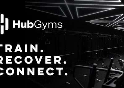 Hub Gyms sharing image showing the Hub Gyms logo top left, with their strapline - Train. Recover. Connect. - below. To the right is a image of the gym showing a modern, monotone decor. Brand designed by Yellow Cat Design.